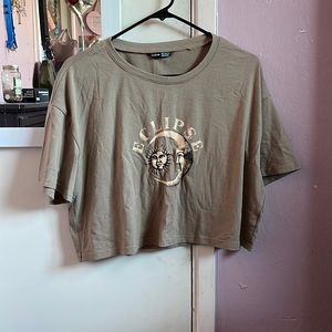 Brown crop top that says “ECLIPSE”